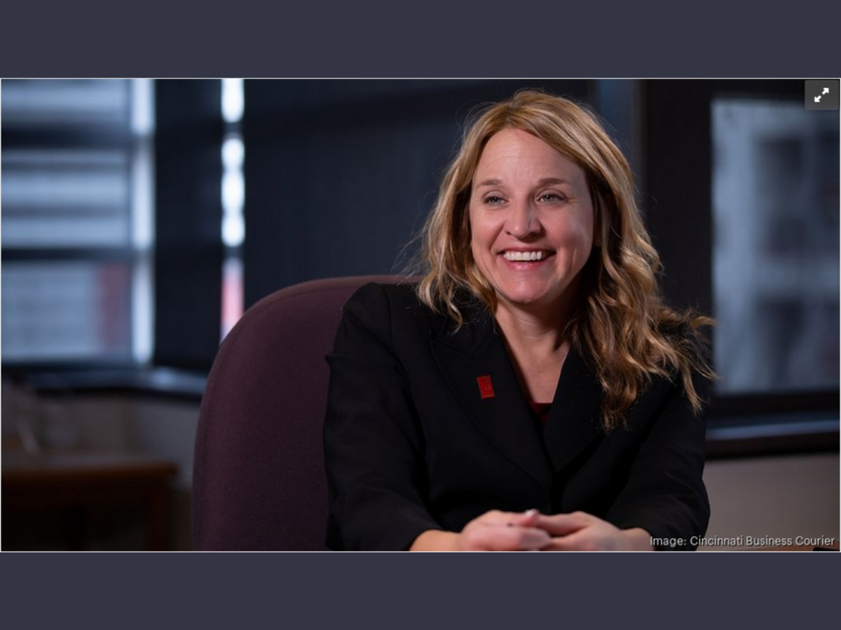 Paula Brehm Heeger sitting on couch