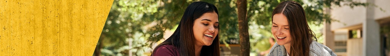 Smiling students outdoors at NKU