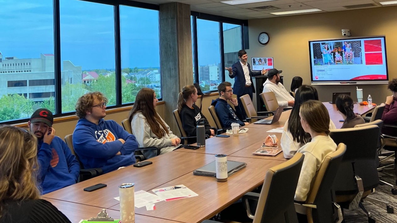 guest speaker in business class