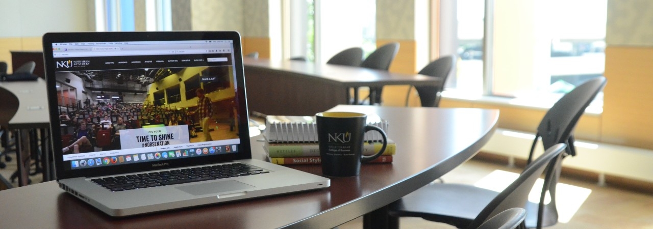 Laptop opened up to NKU's website 