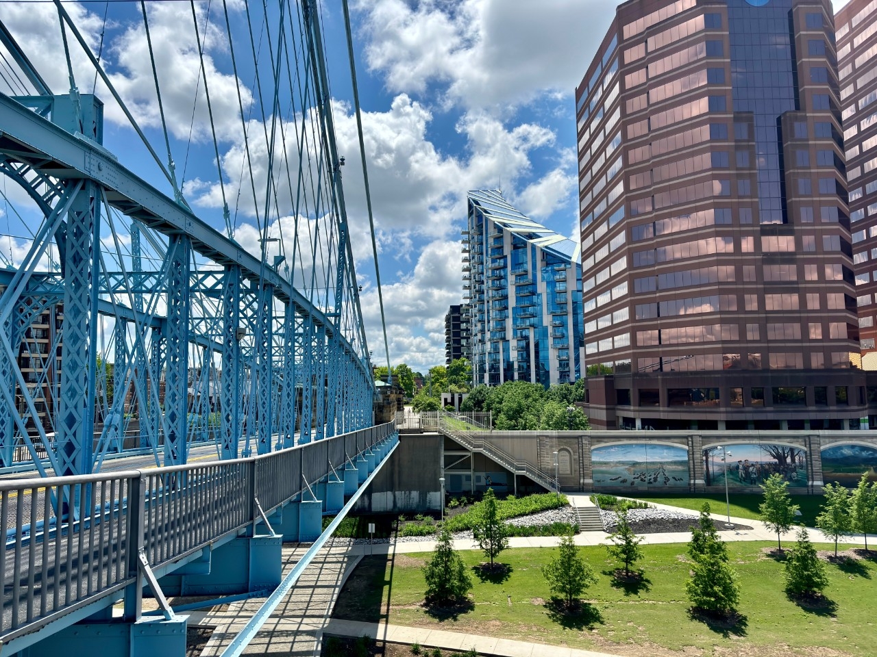 Roebling Bridge leading to modern buildings in Newport, KY Newport KY bridge